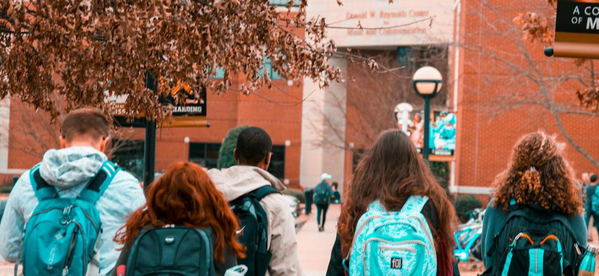 people wearing backpacks